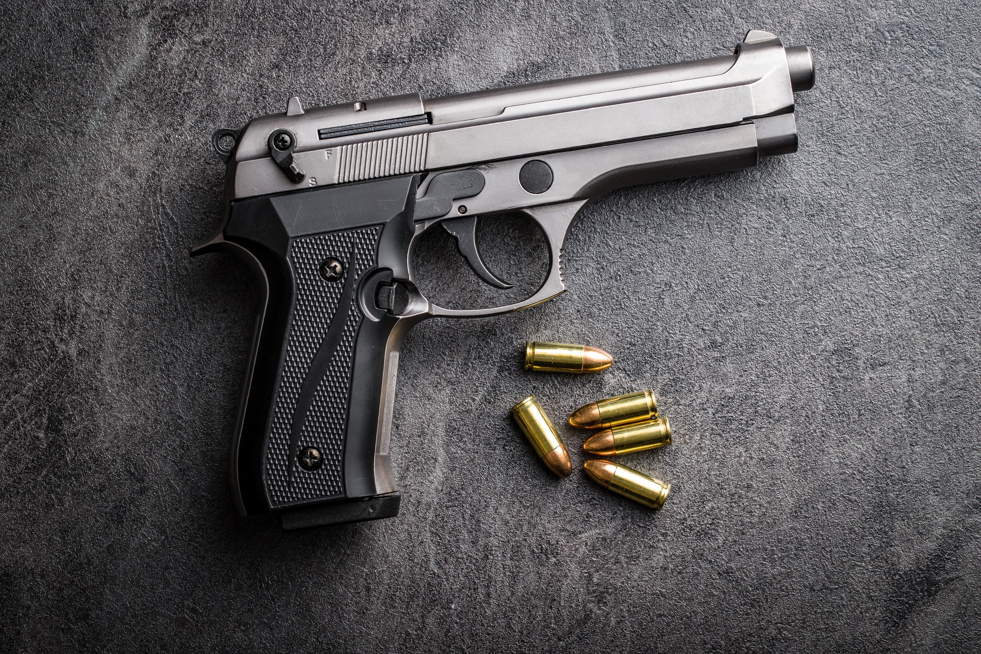 9mm pistol bullets and handgun.