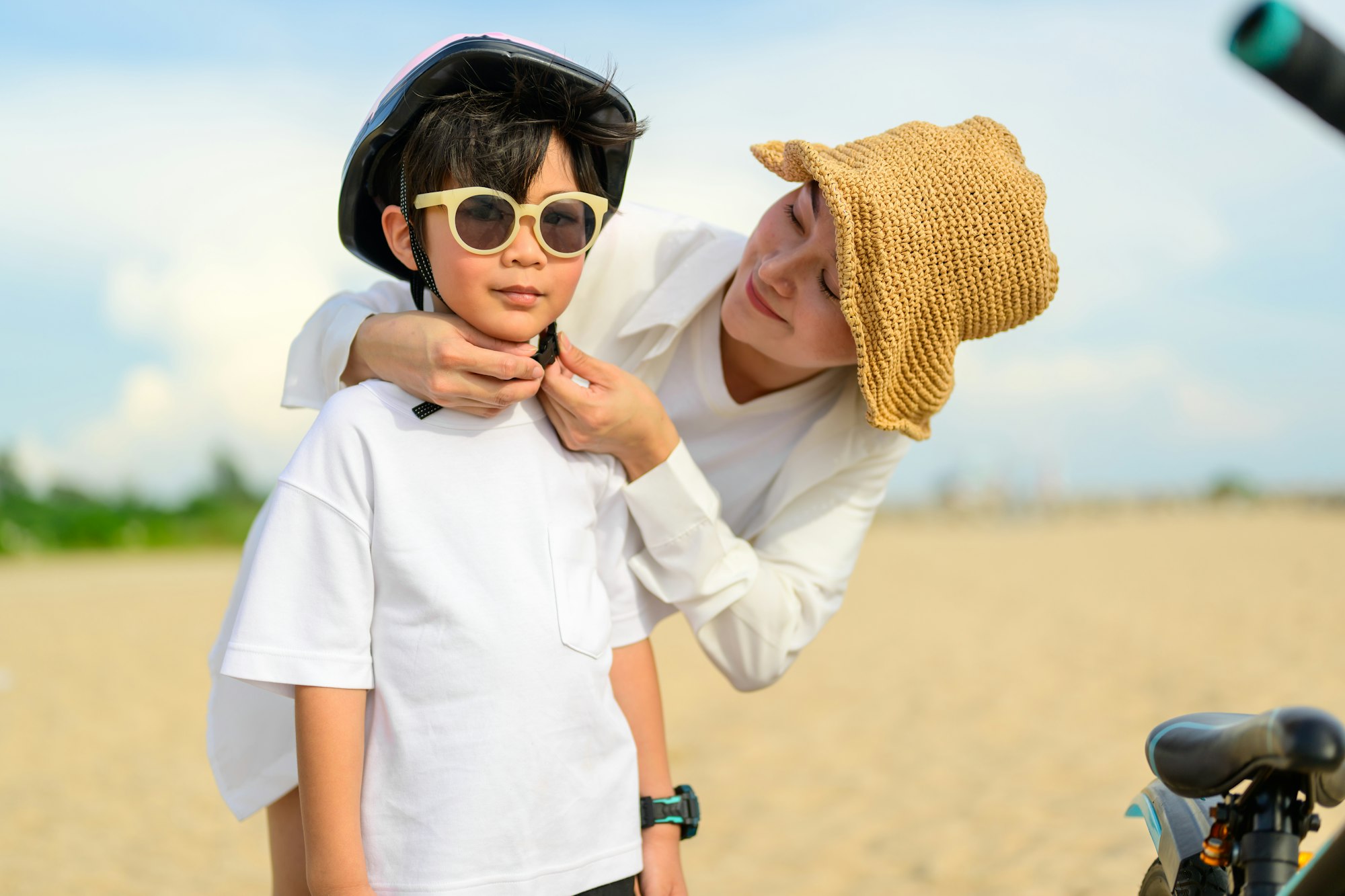 Happy Asian family travel on beach on holiday