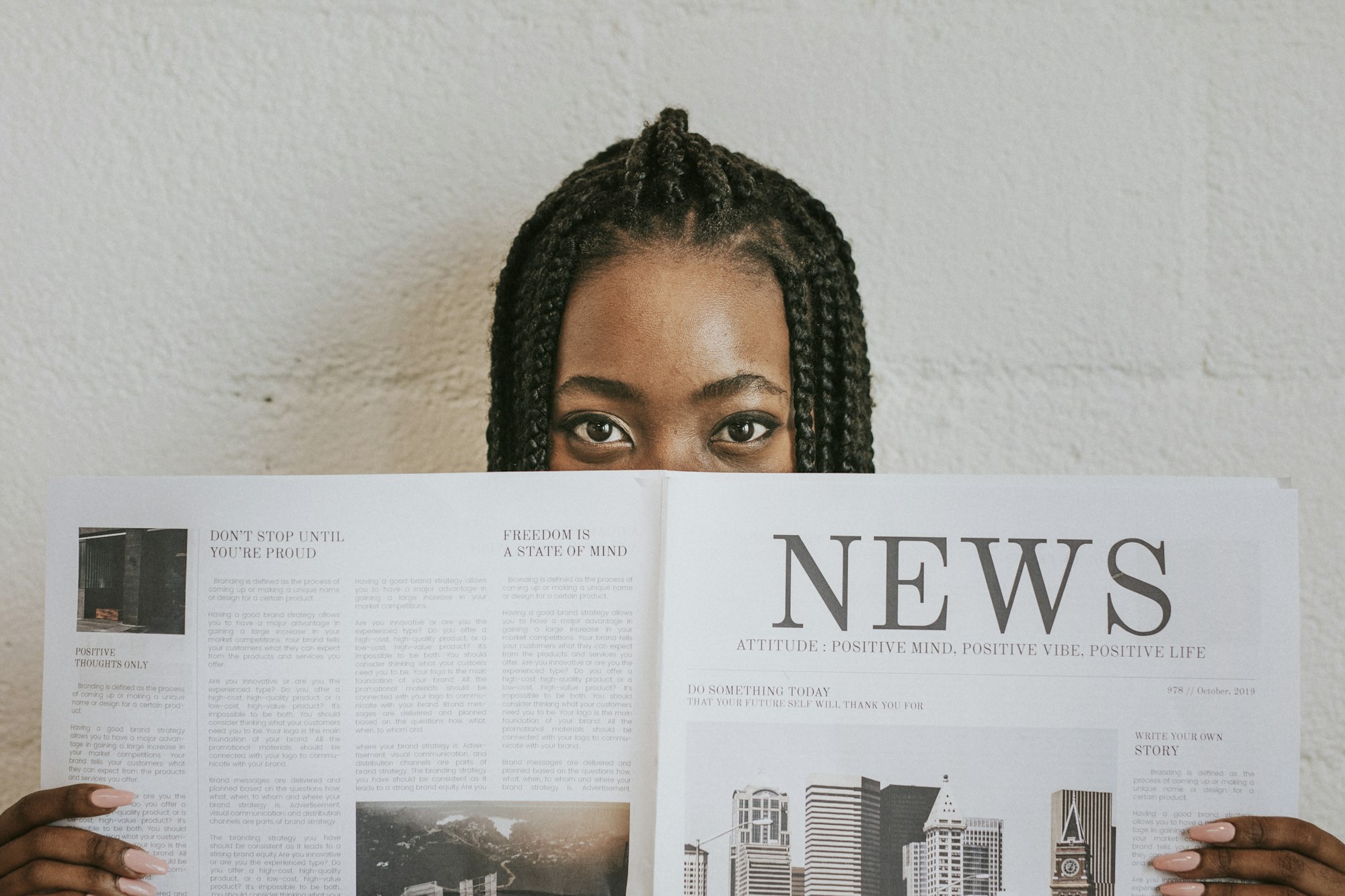 Woman reading newspaper