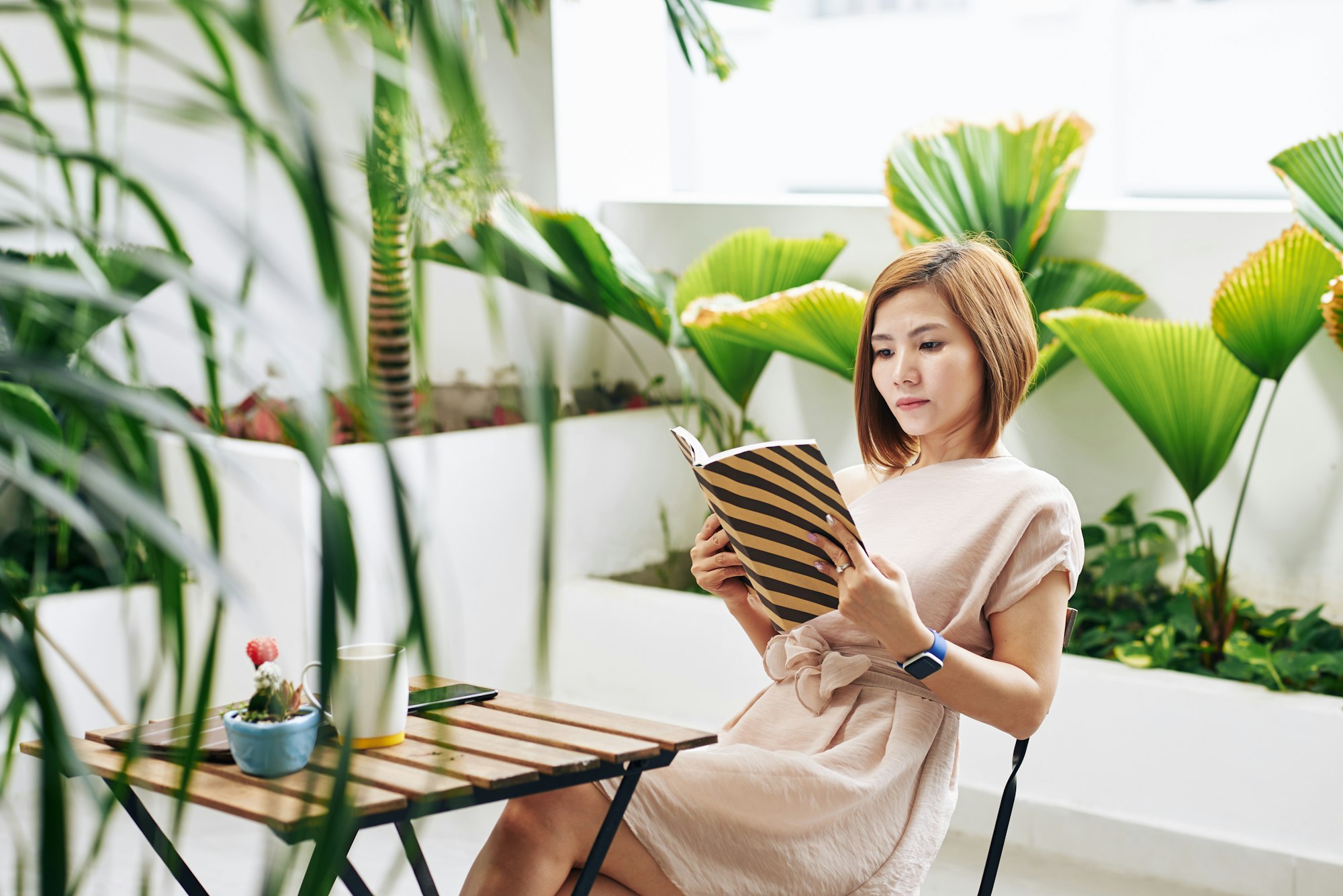 Wwoman reading captivating book