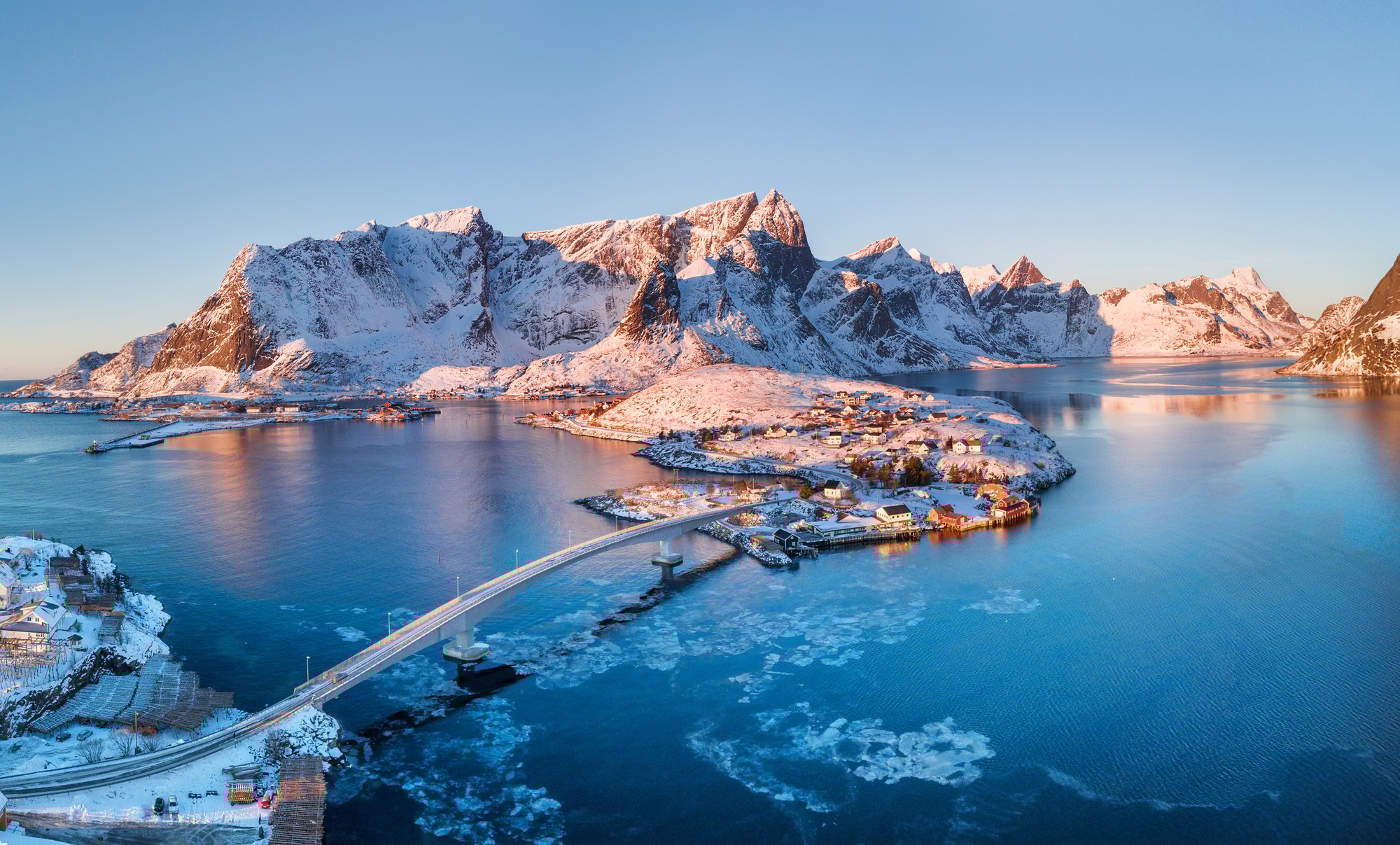 Aerial view at the Lofoten islands, Norway. Mountains and sea during sunset. Natural landscape