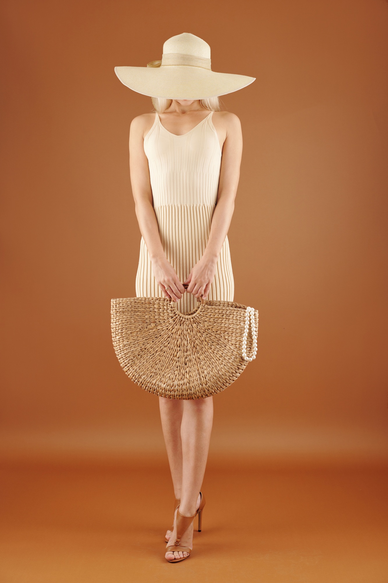 Female Stranger with Straw Bag